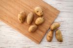 Potato Still Life On Wood Background Flat Lay Stock Photo