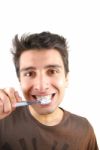 Cute Guy Washing His Teeth Stock Photo