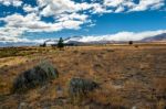 Land Alongside Lake Tekapo Stock Photo