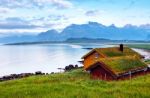 Norway Island In Fjord. Cloudy Nordic Day. Hotel On Island Stock Photo