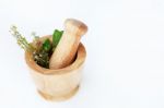 Holy Basil In Wooden Mortar  On White Background Stock Photo