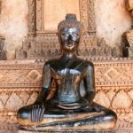 Bronze Buddha Statue At The Haw Phra Kaew, Vientiane, Laos Stock Photo