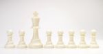 Set Of Black & White Chess Figures On White Background. White Ki Stock Photo