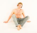 Bare Chested Man With Headphones Stock Photo