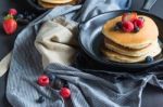 Pancakes With Blueberries  & Raspberry On Wood Background Stock Photo