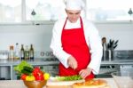 Chef Preparing The Dish Stock Photo