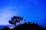 Night Sky With Star On Top Of Mountain Stock Photo