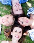 Young Friends Forming A Circle Stock Photo