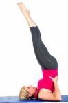 Middle Age Woman Doing Yoga Exercises Stock Photo