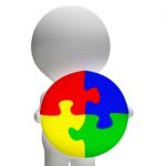 Jigsaw Solution And 3d Character Showing Solution Or Wholeness Stock Photo