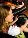 Beautiful Girl In An Electric Bumper Car In Amusement Park Stock Photo