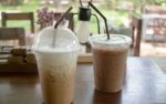 Iced Coffee Take Away Glass On Wooden Table Stock Photo