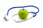 Apple And Stethoscope  Stock Photo