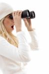 Woman Looking Through Binoculars Stock Photo