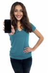 Young Model Displaying Newly Launched Mobile Stock Photo