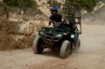 Man Riding Quad Bike Stock Photo