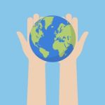 Hand Holding Earth Globe Stock Photo