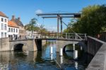 Bridge Over A Canal In Bruges West Flanders In Belgium Stock Photo