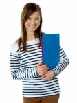 Girl Holding Documents And Posing Stock Photo