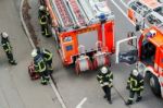 Fire Fighters In Action Stock Photo