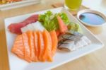 Salmon And Other Fish Raw With Wasabi And Sauce On Table Wood In Stock Photo