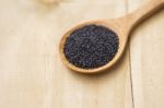 Black Sweet Basil Seed On Wooden Spoon Stock Photo