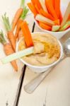 Fresh Hummus Dip With Raw Carrot And Celery Stock Photo