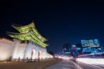 Geyongbokgung Palace And Car Light At Night In Seoul, South Korea Stock Photo