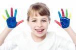 Beautiful Girl With Her Hands In The Paint Stock Photo