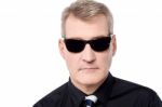 Mature Man Wearing Sunglasses Stock Photo