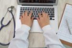 Closeup Of Business Woman Hand Typing On Laptop Keyboard Stock Photo