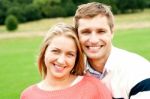 Smiling Young Couple In Outdoor Stock Photo