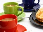 Croissant And Cups Of Coffee Stock Photo