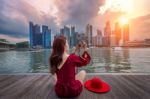 Young Woman Take A Photos In Singapore Stock Photo