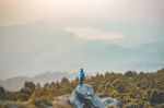 Instagram Filter Young Man Asia Tourist At Mountain Is Watching Over The Misty And Foggy Morning Sunrise, Travel Trekking Stock Photo