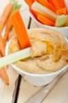 Fresh Hummus Dip With Raw Carrot And Celery Stock Photo