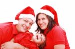 Happy Family In Christmas Costumes Stock Photo