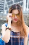 Portrait Of Thai Chinese Adult Glasses Beautiful Girl Denim Blue Bag Relax And Smile Stock Photo