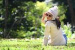 Woman Smiling Outside In Forest Stock Photo