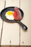 Egg Sunny Side Up With Italian Speck Ham Stock Photo