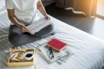 Woman Reading Book Or Newspaper And Drinking Coffee Breakfast On Stock Photo