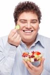 Chubby Man With Fresh Salad Stock Photo