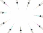 Five Color Syringe Background On Circle View Stock Photo