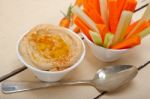 Fresh Hummus Dip With Raw Carrot And Celery Stock Photo