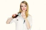 Female Doctor Pouring Syrup Stock Photo