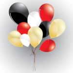 Red And Gold With Black, White On A Balloons. Multicolored Balloons On A Grey Background. Balloons Stock Photo