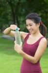 Young Woman Drinking Water Stock Photo