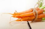 Baby Carrots Bunch Tied With Rope Stock Photo