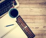 Office Desk With Coffee Background Stock Photo