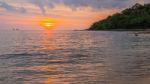 A Beach Scene With Sunset In The Background At Kood Island, Thai Stock Photo